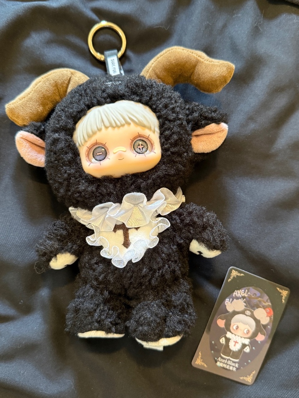 Dark Forest Axel Black purse charm